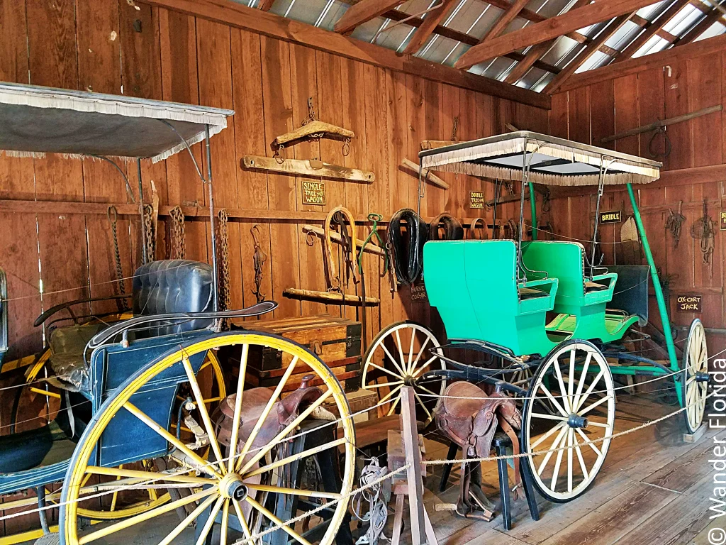 Carriages inside the Lowe Barn at Heritage Village