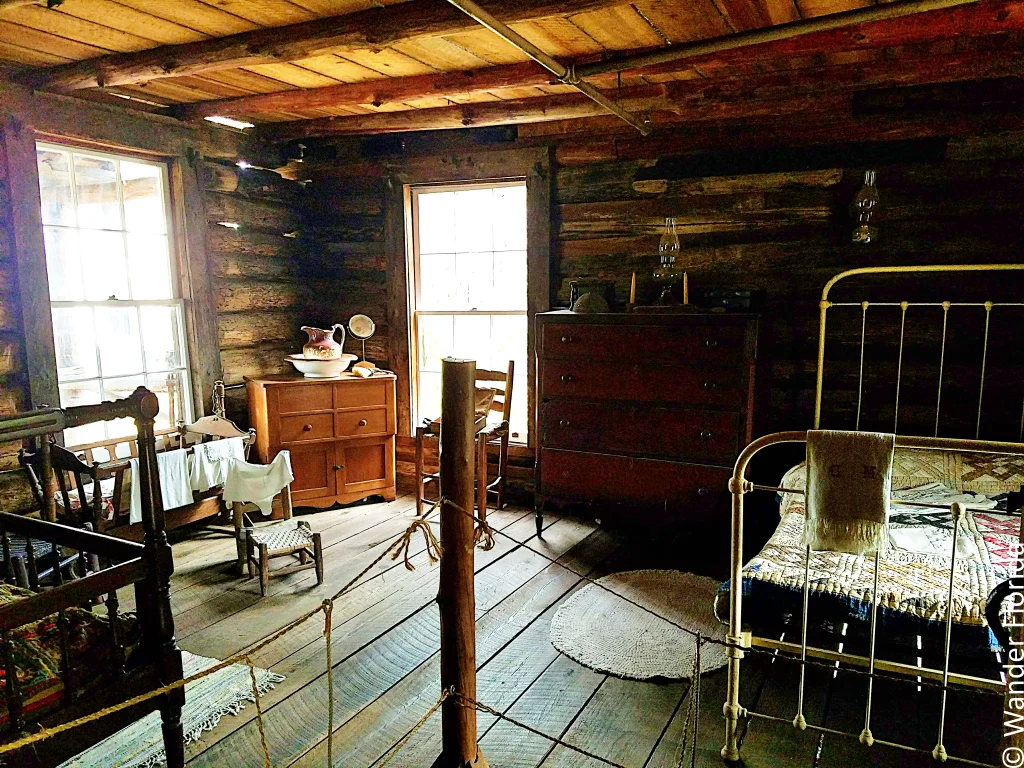 Inside of the McMullen-Coachman Cabin showing how it would have looked in the early 1900s.