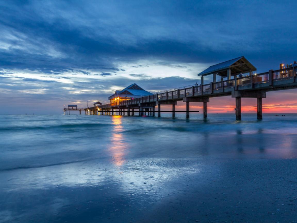 13 Romantic Beaches in Florida Offer the Perfect Couple's Getaway 10 Pier 60 at sunset on romantic Clearwater Beach