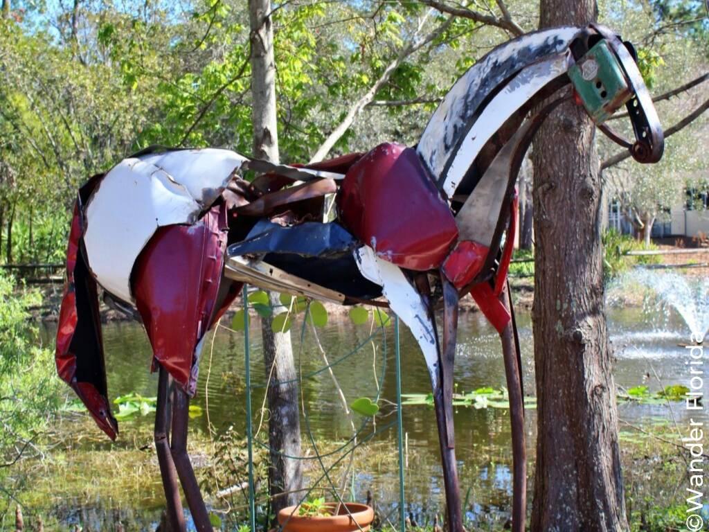 Florida Botanical Gardens - A Beautiful Hidden Gem in Largo 4 A brown and gray metal horse sculpture in the cactus and succulent garden, one of many art pieces which rotate through Florida Botanical Gardens.