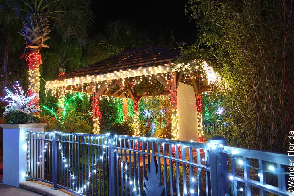 Florida Botanical Gardens - A Beautiful Hidden Gem in Largo 56 A gazebo and fence at Florida Botanical Gardens decorated in holiday lights.