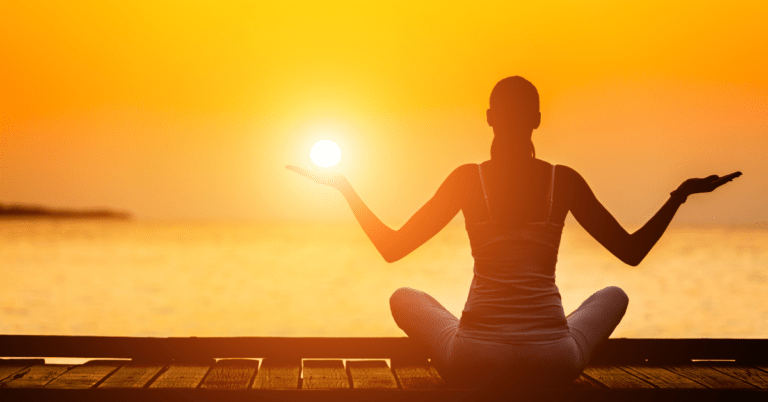 7 Mindful Ways to Get Your Zen On in Tampa, FL 3 Woman sitting on dock meditating
